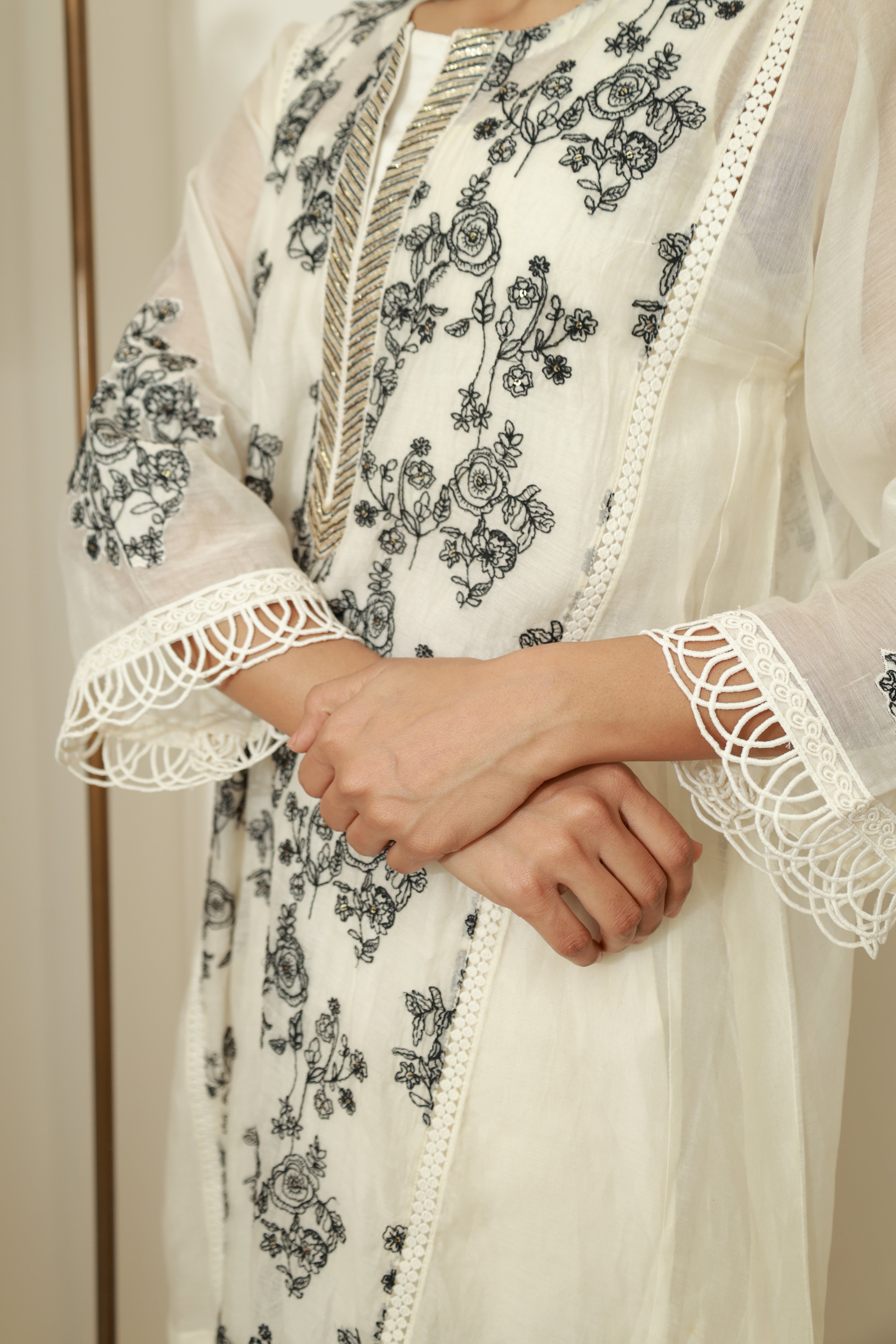 Kaner Kurta Set in Black over White
3